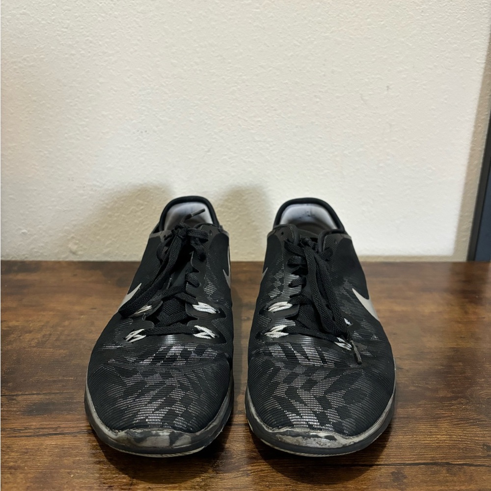 Black Woman’s Nike Running Shoes